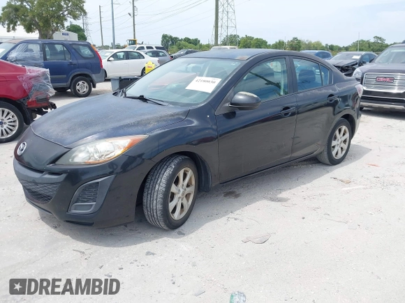 2011 Mazda Mazda3 i Touring with VIN JM1BL1VFXB1472772, listed as a IAAI auction lot 42180030 with 128,438 mi miles. Bid and sale history available at carsss.com. Image 2.