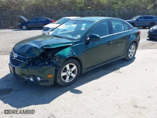 2014 Chevrolet Cruze 1LT with VIN 1G1PC5SB5E7187521, listed as a IAAI auction lot 41914482 with 149,217 mi miles. Bid and sale history available at carsss.com. Image 2.
