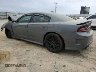 2019 Dodge Charger Scat Pack z VIN 2C3CDXGJ7KH646213, wystawiony jako Copart lot #51653065 z przebiegiem 63 229 mil mil oraz Szkoda całkowita • Salvage title. Historia ofert i sprzedaży dostępna na DreamBid. Obrazek 2.