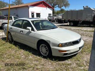 2000 Mitsubishi Diamante LS with VIN 6MMAP67P4YT001142, listed as a Copart auction lot 49667135 with 243,861 mi miles and Clean Title. Bid and sale history available at carsss.com. Image 1.