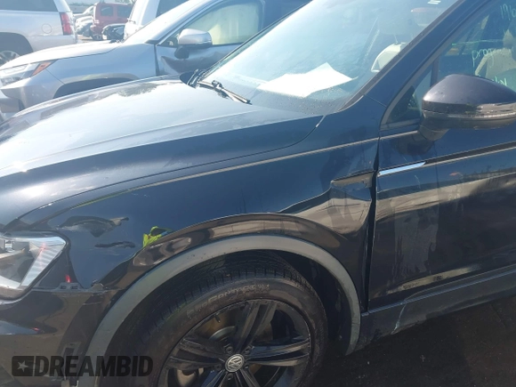 2019 Volkswagen Tiguan SE z VIN 3VV3B7AX3KM135261, wystawiony jako IAAI lot #42600904 z przebiegiem 62 026 mil mil oraz . Historia ofert i sprzedaży dostępna na DreamBid. Obrazek 17.