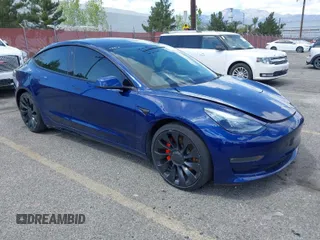 2022 Tesla Model 3 Performance with VIN 5YJ3E1EC1NF296758, listed as a IAAI auction lot 41960443 with 30,754 mi miles. Bid and sale history available at carsss.com. Image 1.
