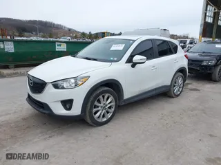 2015 Mazda CX-5 Grand Touring with VIN JM3KE4DY9F0542263, listed as a IAAI auction lot 41454646 with 104,340 mi miles. Bid and sale history available at carsss.com. Image 18.