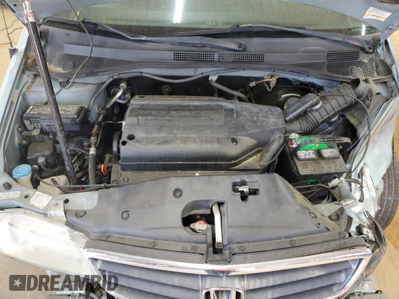 2004 Honda Odyssey EX-L z VIN 5FNRL18044B020316, wystawiony jako Copart lot #56027435 z przebiegiem 192 429 mil mil oraz Szkoda całkowita • Salvage title. Historia ofert i sprzedaży dostępna na DreamBid. Obrazek 12.