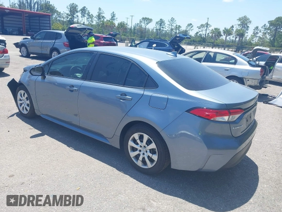 2023 Toyota Corolla LE with VIN 5YFB4MDE9PP016692, listed as a IAAI auction lot 42136141 with 34,671 mi miles and . Bid and sale history available at carsss.com. Image 3.