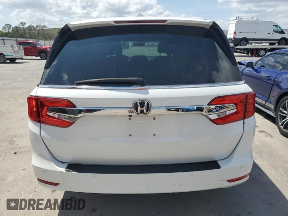2020 Honda Odyssey Elite with VIN 5FNRL6H99LB063690, listed as a Copart auction lot 51225435 with 70,721 mi miles and Salvage Title. Bid and sale history available at DreamBid. Image 6.