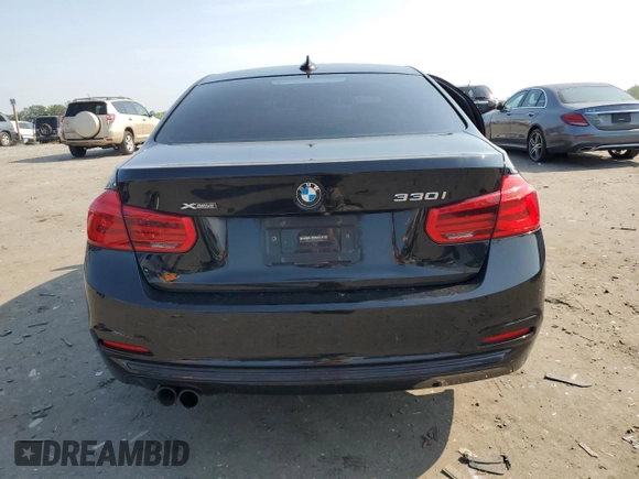2018 BMW 3 Series 330i xDrive with VIN WBA8D9G56JNU69320, listed as a Copart auction lot 60794345 with 104,036 mi miles and Salvage title. Bid and sale history available at DreamBid. Image 6.