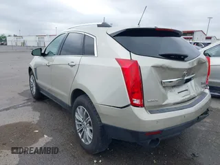 2015 Cadillac SRX Performance Collection with VIN 3GYFNCE34FS639168, listed as a IAAI auction lot 42191995 with 101,358 mi miles and . Bid and sale history available at DreamBid. Image 3.
