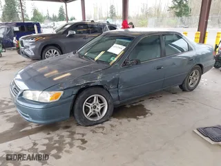 2000 Toyota Camry CE with VIN 4T1BG22KXYU923956, listed as a IAAI auction lot 41937950 with 101,539 mi miles. Bid and sale history available at carsss.com. Image 18.