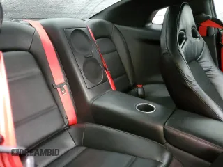 2009 Nissan GT-R Premium z VIN JN1AR54F19M250958, wystawiony jako Copart lot #51364685 z przebiegiem 59 437 mil mil oraz Szkody całkowita. Historia ofert i sprzedaży dostępna na DreamBid. Obrazek 10.