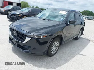 2024 Mazda CX-5 S Select with VIN JM3KFBBL1R0503003, listed as a IAAI auction lot 42149860 with 23,133 mi miles and . Bid and sale history available at DreamBid. Image 2.