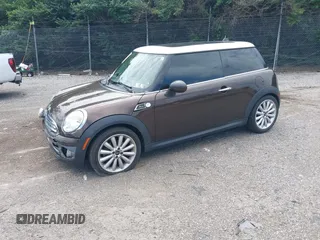 2010 MINI Hardtop with VIN WMWMF3C55ATZ23127, listed as a IAAI auction lot 42667783 with 61,954 mi miles and . Bid and sale history available at DreamBid. Image 2.