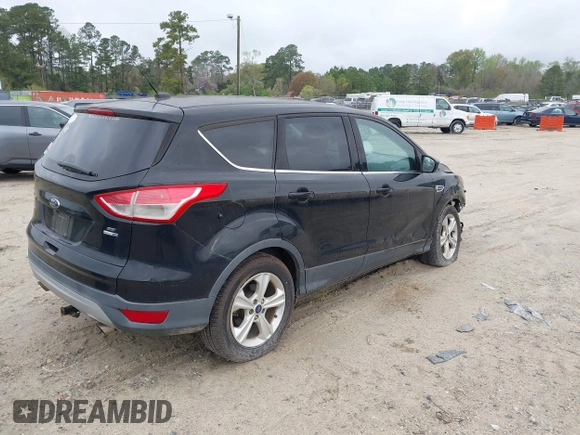 2016 Ford Escape SE with VIN 1FMCU9G99GUC13053, listed as a IAAI auction lot 41888535 with 84,019 mi miles. Bid and sale history available at carsss.com. Image 4.