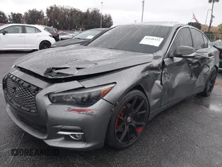 2014 Infiniti Q50 with VIN JN1BV7AP5EM688434, listed as a IAAI auction lot 41548512 with 110,846 mi miles. Bid and sale history available at carsss.com. Image 2.