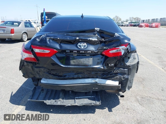 2020 Toyota Camry LE with VIN 4T1C11AKXLU955851, listed as a IAAI auction lot 41996827 with 59,008 mi miles and . Bid and sale history available at carsss.com. Image 18.
