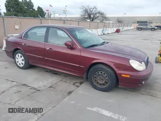 2004 Hyundai Sonata with VIN KMHWF25S84A040837, listed as a IAAI auction lot 41591528 with 76,606 mi miles. Bid and sale history available at carsss.com. Image 1.
