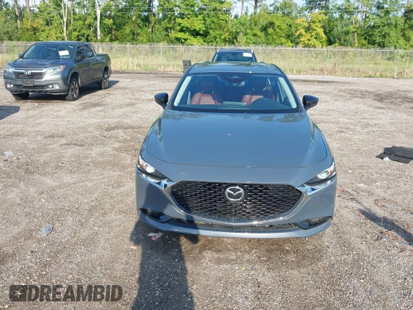 2024 Mazda 3 S Carbon Edition with VIN 3MZBPBCM6RM411828, listed as a IAAI auction lot 42802141 with 40,061 mi miles and . Bid and sale history available at DreamBid. Image 12.