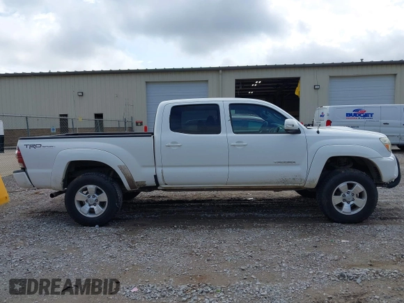 2013 Toyota Tacoma PreRunner z VIN 5TFKU4HN6DX003129, wystawiony jako IAAI lot #42190939 z przebiegiem 206 404 mil mil oraz . Historia ofert i sprzedaży dostępna na DreamBid. Obrazek 13.