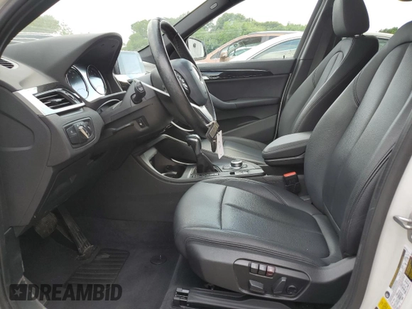 2019 BMW X1 xDrive28i with VIN WBXHT3C59K5L90317, listed as a Copart auction lot 61028125 with 46,789 mi miles and Salvage title. Bid and sale history available at DreamBid. Image 7.