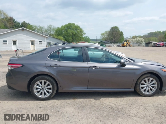 2019 Toyota Camry LE with VIN 4T1B11HK9KU229110, listed as a IAAI auction lot 42133332 with 17,541 mi miles and . Bid and sale history available at DreamBid. Image 14.