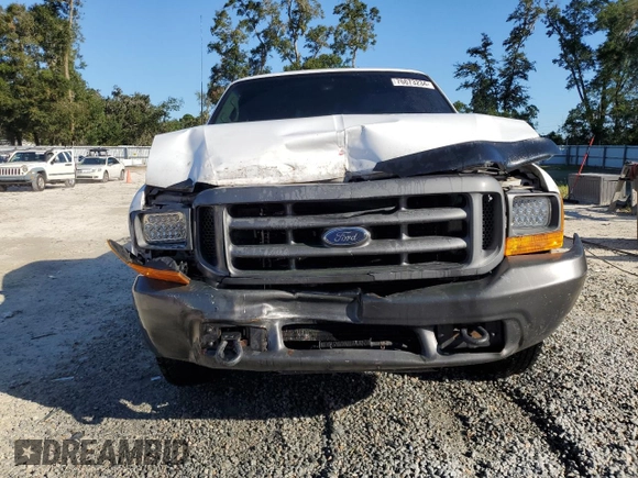 2000 Ford Super Duty F-250 XL with VIN 1FTNF20F9YEC91357, listed as a Copart auction lot 76673234 with 318,306 mi miles and Salvage Title. Bid and sale history available at carsss.com. Image 5.