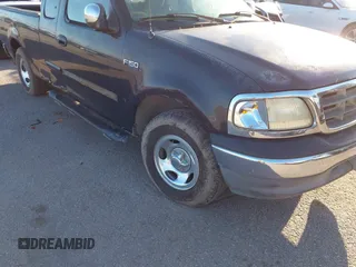 2002 Ford F-150 XL with VIN 2FTRX17282CA94608, listed as a IAAI auction lot 41215380 with 1 mi miles. Bid and sale history available at carsss.com. Image 6.