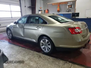 2012 Ford Taurus Limited with VIN 1FAHP2JW3CG142762, listed as a Copart auction lot 77864584 with 131,911 mi miles and Salvage title. Bid and sale history available at DreamBid. Image 2.