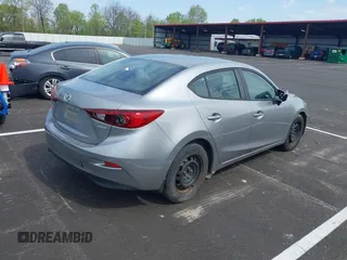 2014 Mazda 3 i SV with VIN JM1BM1T73E1171466, listed as a IAAI auction lot 41999827 with 157,739 mi miles and . Bid and sale history available at DreamBid. Image 4.