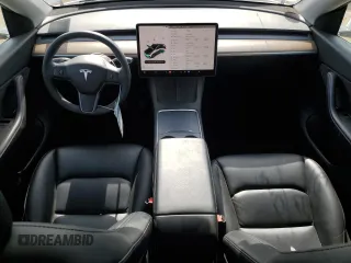 2022 Tesla Model Y Long Range z VIN 7SAYGAEE2NF465173, wystawiony jako Copart lot #53983845 z przebiegiem 42 740 mil mil oraz Szkody całkowita. Historia ofert i sprzedaży dostępna na DreamBid. Obrazek 8.