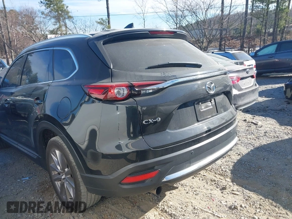 2020 Mazda CX-9 Grand Touring with VIN JM3TCADY8L0405173, listed as a IAAI auction lot 41701533 with 58,119 mi miles and . Bid and sale history available at DreamBid. Image 3.