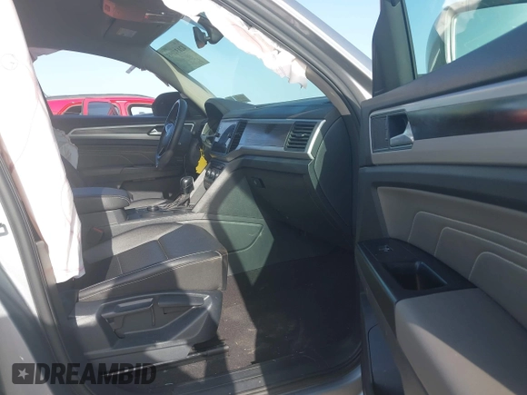 2021 Volkswagen Atlas SE z VIN 1V2LP2CA1MC538847, wystawiony jako IAAI lot #42134093 z przebiegiem 66 678 mil mil oraz . Historia ofert i sprzedaży dostępna na DreamBid. Obrazek 5.