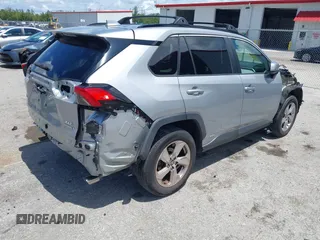 2021 Toyota RAV4 Hybrid LE with VIN 2T3B6RFV2MW018967, listed as a IAAI auction lot 42601989 with 71,046 mi miles and . Bid and sale history available at DreamBid. Image 4.