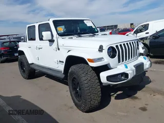 2021 Jeep Wrangler Unlimited Sahara with VIN 1C4JJXP63MW716690, listed as a IAAI auction lot 42087879 with 40,889 mi miles and . Bid and sale history available at DreamBid. Image 1.