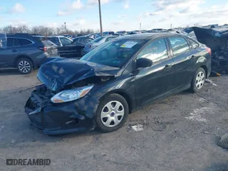 2014 Ford Focus S with VIN 1FADP3E26EL410628, listed as a IAAI auction lot 41590044 with 88,602 mi miles. Bid and sale history available at carsss.com. Image 2.