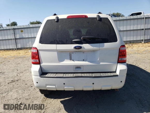 2012 Ford Escape XLT z VIN 1FMCU9DG5CKC08988, wystawiony jako Copart lot #60741765 z przebiegiem 93 114 mil mil oraz Czysty tytuł • Clean title. Historia ofert i sprzedaży dostępna na DreamBid. Obrazek 6.