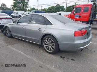 2011 Audi A8 with VIN WAUAVAFD0BN018197, listed as a IAAI auction lot 42221435 with 74,465 mi miles and . Bid and sale history available at DreamBid. Image 3.