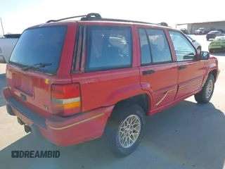 1993 Jeep Grand Cherokee Limited with VIN 1J4GZ78Y1PC566288, listed as a IAAI auction lot 41677921 with 73,490 mi miles. Bid and sale history available at carsss.com. Image 4.