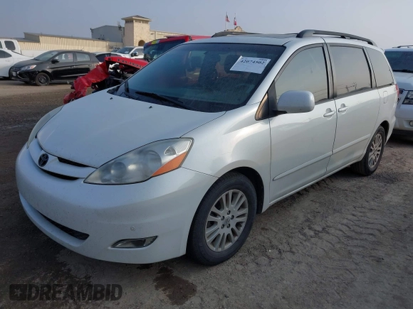 2009 Toyota Sienna XLE with VIN 5TDZK22C19S227678, listed as a IAAI auction lot 42074502 with 173,718 mi miles. Bid and sale history available at carsss.com. Image 2.