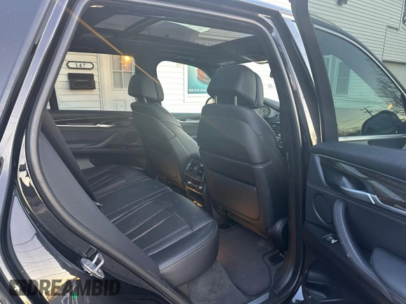2018 BMW X5 xDrive35i with VIN 5UXKR0C57J0X83615, listed as a Copart auction lot 83307484 with 174,911 mi miles and Clean Title. Bid and sale history available at carsss.com. Image 7.