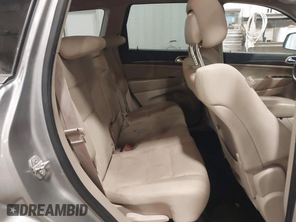 2015 Jeep Grand Cherokee Laredo with VIN 1C4RJFAG4FC797069, listed as a IAAI auction lot 41435299 with 146,755 mi miles. Bid and sale history available at carsss.com. Image 8.