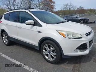 2013 Ford Escape SEL with VIN 1FMCU9HXXDUD82944, listed as a IAAI auction lot 42079667 with 97,304 mi miles. Bid and sale history available at carsss.com. Image 1.