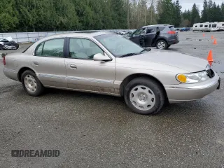 2002 Lincoln Continental with VIN 1LNHM97V22Y693053, listed as a Copart auction lot 85540044 with 179,465 mi miles and Salvage Title. Bid and sale history available at carsss.com. Image 4.