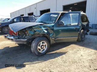 1994 Ford Explorer Eddie Bauer z VIN 1FMDU34X2RUC11751, wystawiony jako Copart lot #41621815 z przebiegiem 72 074 mil mil oraz Nie do naprawy. Historia ofert i sprzedaży dostępna na DreamBid. Obrazek 1.