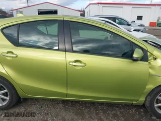 2015 Toyota Prius c One with VIN JTDKDTB36F1096872, listed as a IAAI auction lot 41202434 with 130,386 mi miles. Bid and sale history available at carsss.com. Image 13.