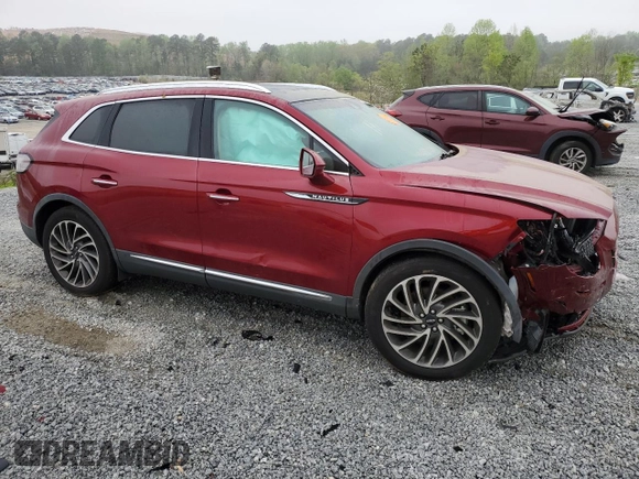 2019 Lincoln Nautilus Reserve z VIN 2LMPJ6L9XKBL57034, wystawiony jako Copart lot #51652415 z przebiegiem 51 302 mil mil oraz Szkoda całkowita • Salvage title. Historia ofert i sprzedaży dostępna na DreamBid. Obrazek 4.