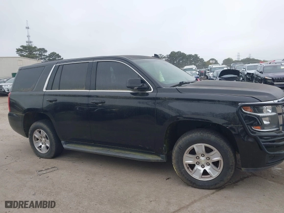 2017 Chevrolet Tahoe Commercial with VIN 1GNLCDECXHR304319, listed as a IAAI auction lot 41924011 with 130,566 mi miles. Bid and sale history available at carsss.com. Image 13.