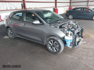 2021 Kia Rio 5-Door S with VIN 3KPA25AD1ME374790, listed as a IAAI auction lot 41860386 with NaN miles. Bid and sale history available at carsss.com. Image 1.