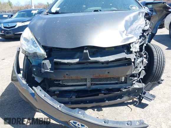 2014 Toyota Prius One with VIN JTDKDTB31E1568233, listed as a IAAI auction lot 42132907 with 96,093 mi miles and . Bid and sale history available at DreamBid. Image 17.