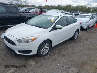 2017 Ford Focus SE with VIN 1FADP3F26HL320298, listed as a IAAI auction lot 41995617 with 128,704 mi miles. Bid and sale history available at carsss.com. Image 2.