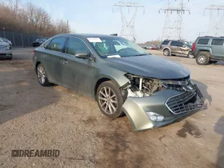 2013 Toyota Avalon XLE with VIN 4T1BK1EB7DU058457, listed as a IAAI auction lot 41791707 with 139,240 mi miles and . Bid and sale history available at carsss.com. Image 1.